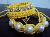 Kit com três pulseiras amarela+águia